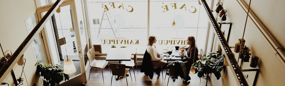 a photo of ideal customer in a cafe