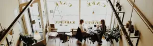 a photo of ideal customer in a cafe